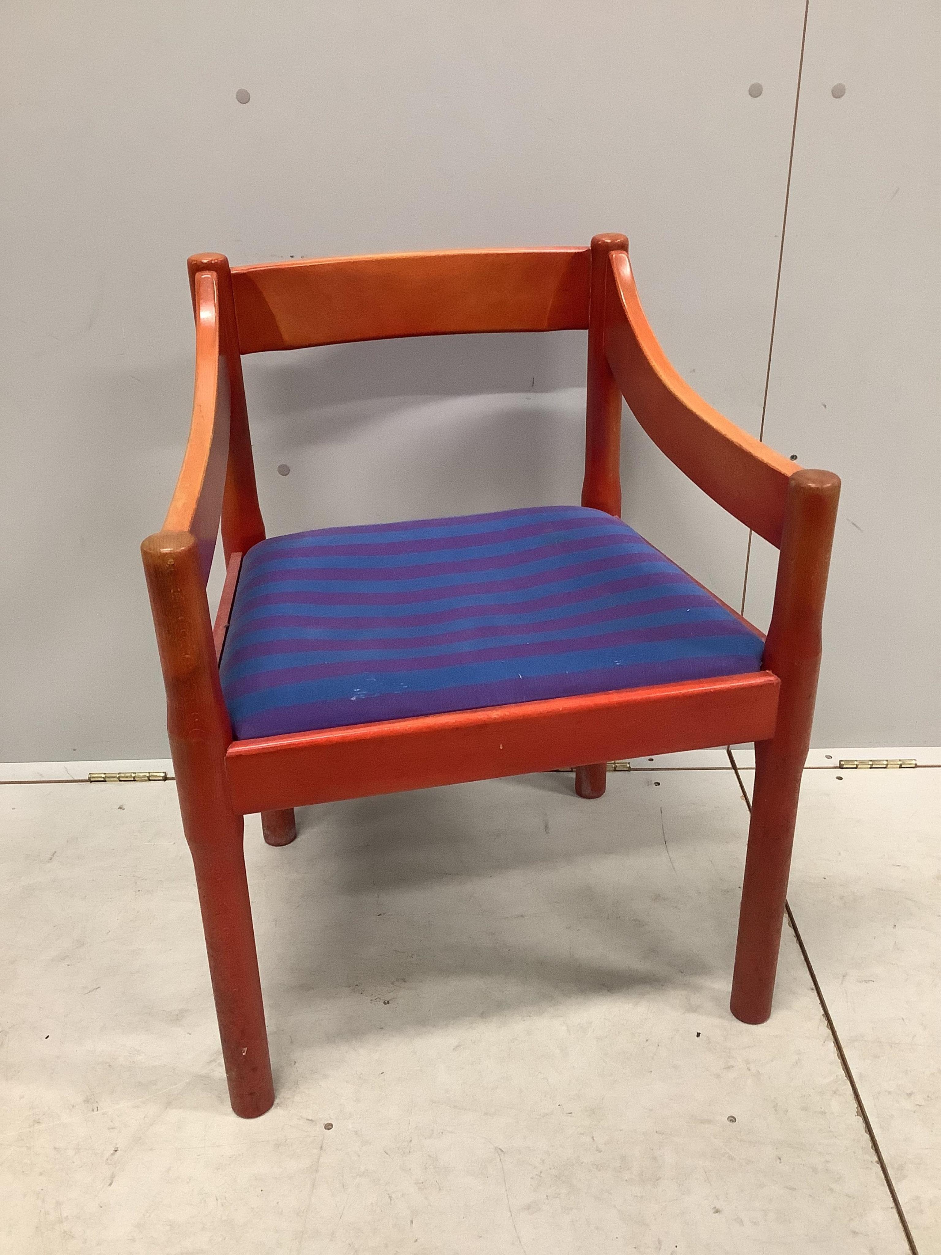 An early Habitat Magistretti style red stained beech settee, width 198cm, depth 84cm, height 69cm and a matching elbow chair. Condition - poor to fair